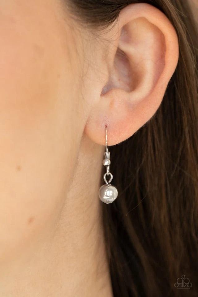 Paparazzi Accessories Ever Rebellious - Blue Glistening silver chains and strands of metallic blue crystal-like beads and glistening silver beads stream from the bottom of a bold silver chain, creating a sassy fringe below the collar. Features an adjustab
