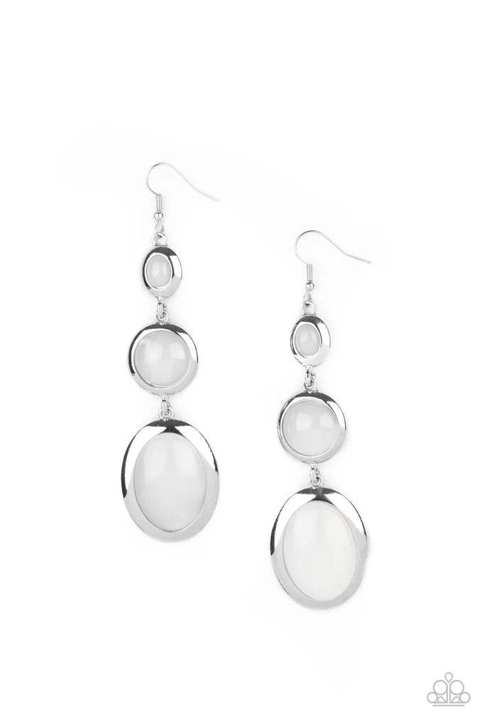 Paparazzi Accessories Retro Reality - White Featuring cloudy finishes, mismatched glassy white beads are encased in sleek silver frames that whimsically link into a colorfully retro lure. Earring attaches to a standard fishhook fitting. Sold as one pair o