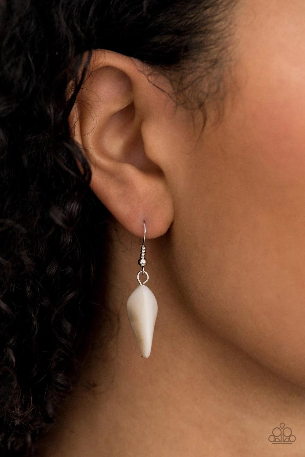 Paparazzi Accessories Seacoast Sunset - Yellow A whimsical collection of silver, opaque crystal-like, cloudy white, and faceted yellow beads are threaded along invisible wires, creating statement-making layers below the collar. Features an adjustable clas