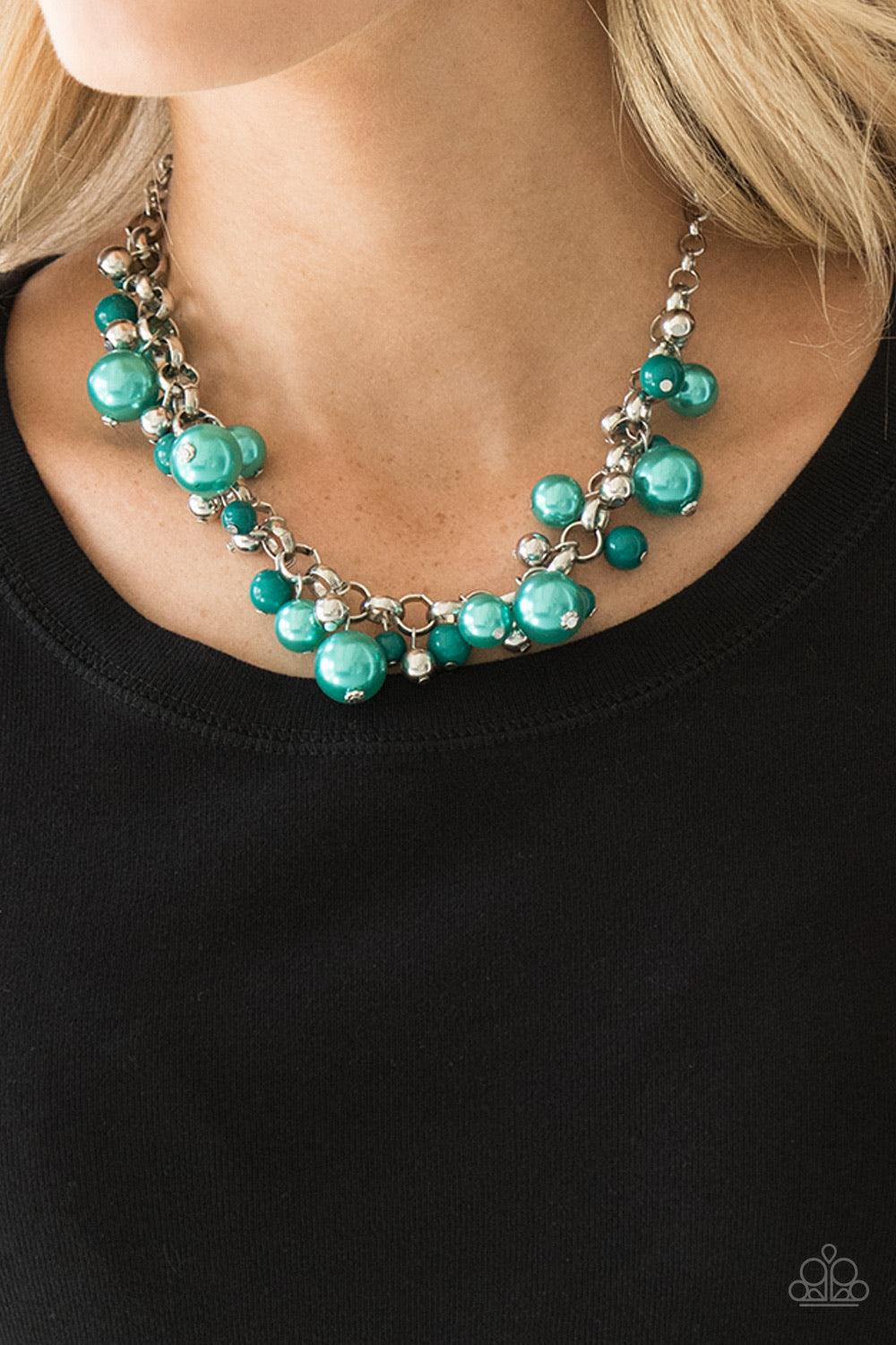 Paparazzi Accessories The Upstater - Green Varying in size, bubbly green pearls, classic silver beads, and shiny green beads swing from the bottom of a glistening silver chain, creating a refined fringe below the collar. Features an adjustable clasp closu