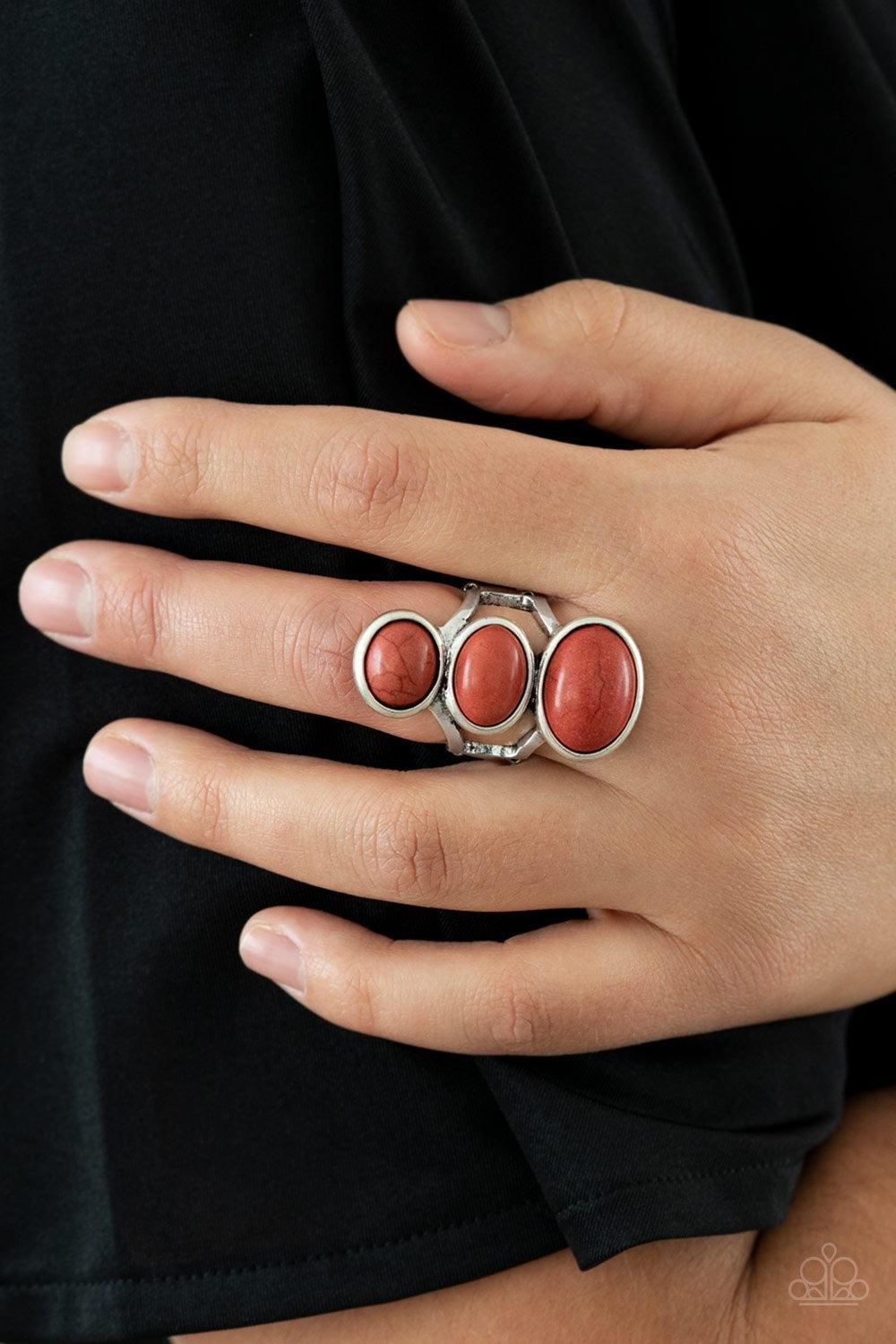 Paparazzi Accessories Rural Revolution - Brown Dotted with three brown stones set into a silver frame for a southwestern look. Features a stretchy band for a flexible fit. Jewelry