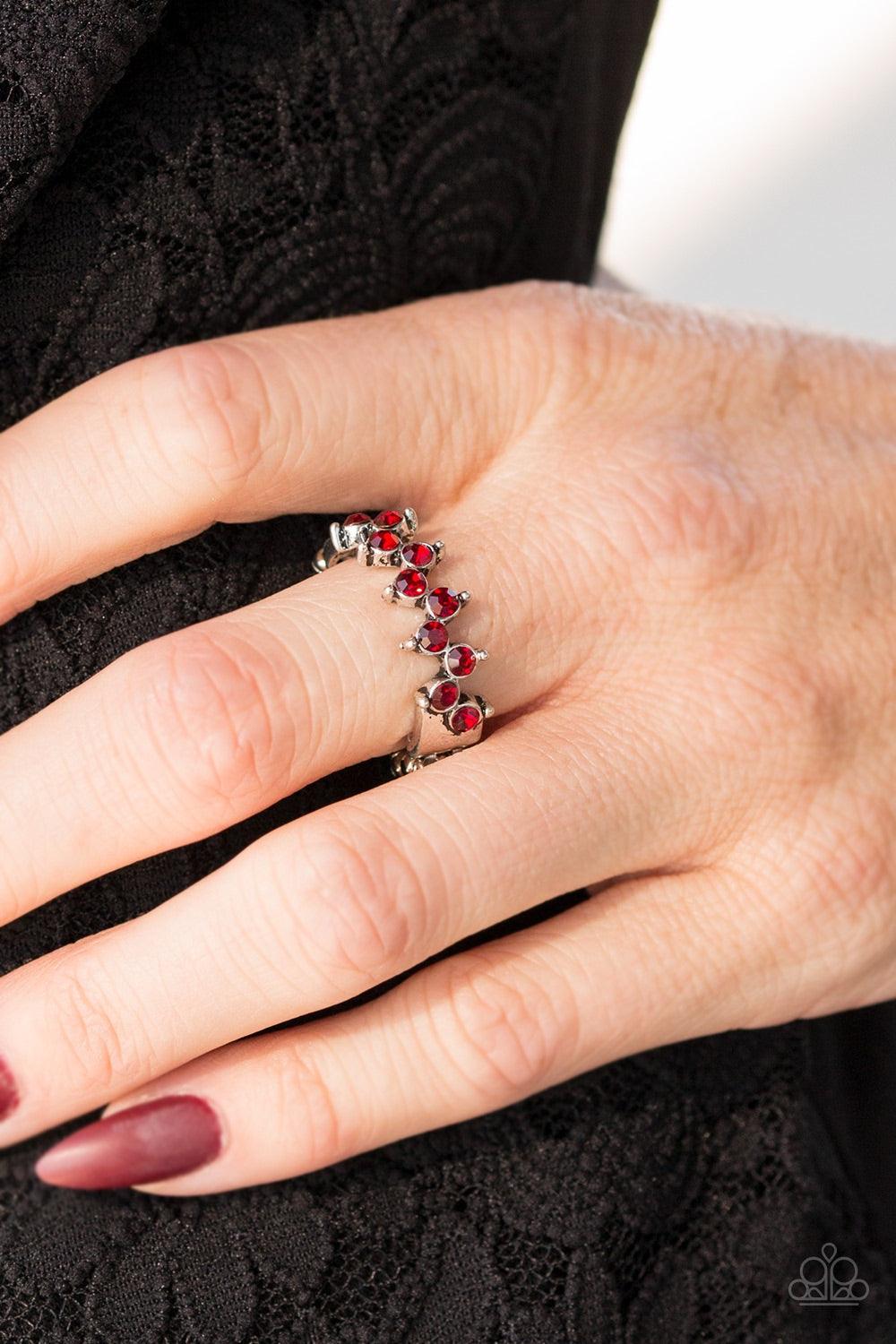 Paparazzi Accessories Shine Like The Stars - Red Glittery red rhinestones stack across the finger, creating a timeless band. Features a dainty stretchy band for a flexible fit. Jewelry