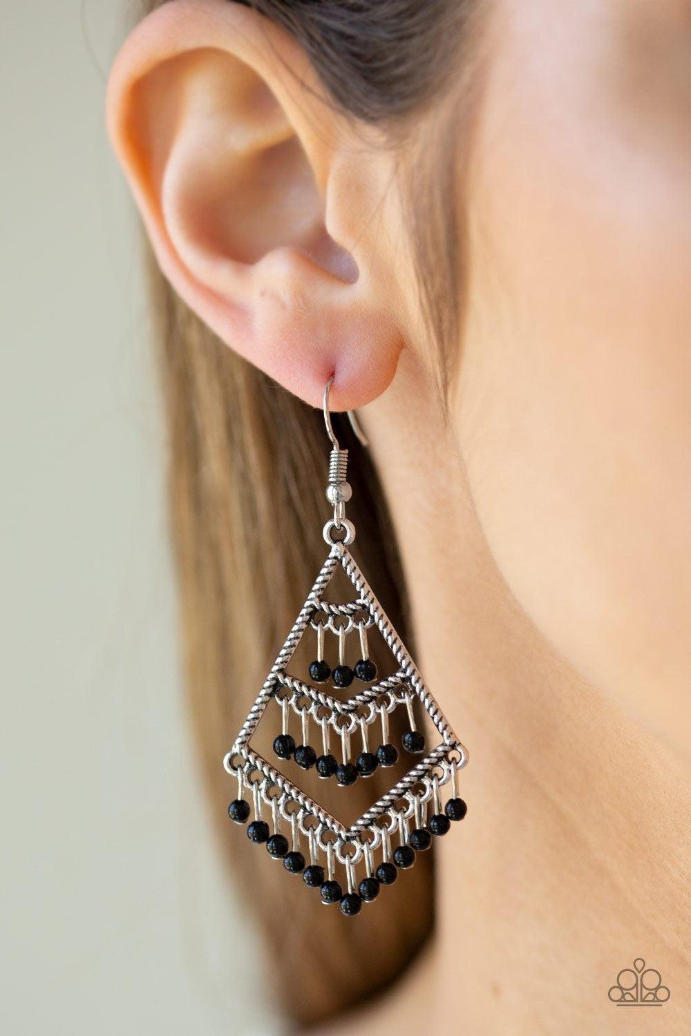 Paparazzi Accessories Kite Race - Black Rows of dainty black beads swing from an ornate silver kite-shaped frame, creating a tiered fringe. Earring attaches to a standard fishhook fitting. Jewelry