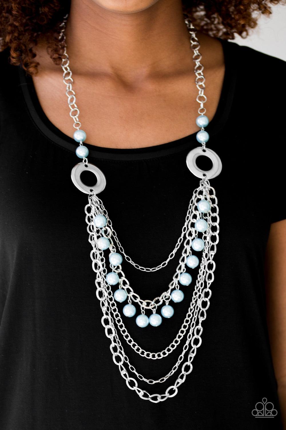 Paparazzi Accessories BELLES and Whistles - Blue Dramatic silver hoops give way to layers of mismatched silver chains. Pearly blue beads trickle from the second chain, creating a flirty fringe across the chest. Features an adjustable clasp closure. Sold a