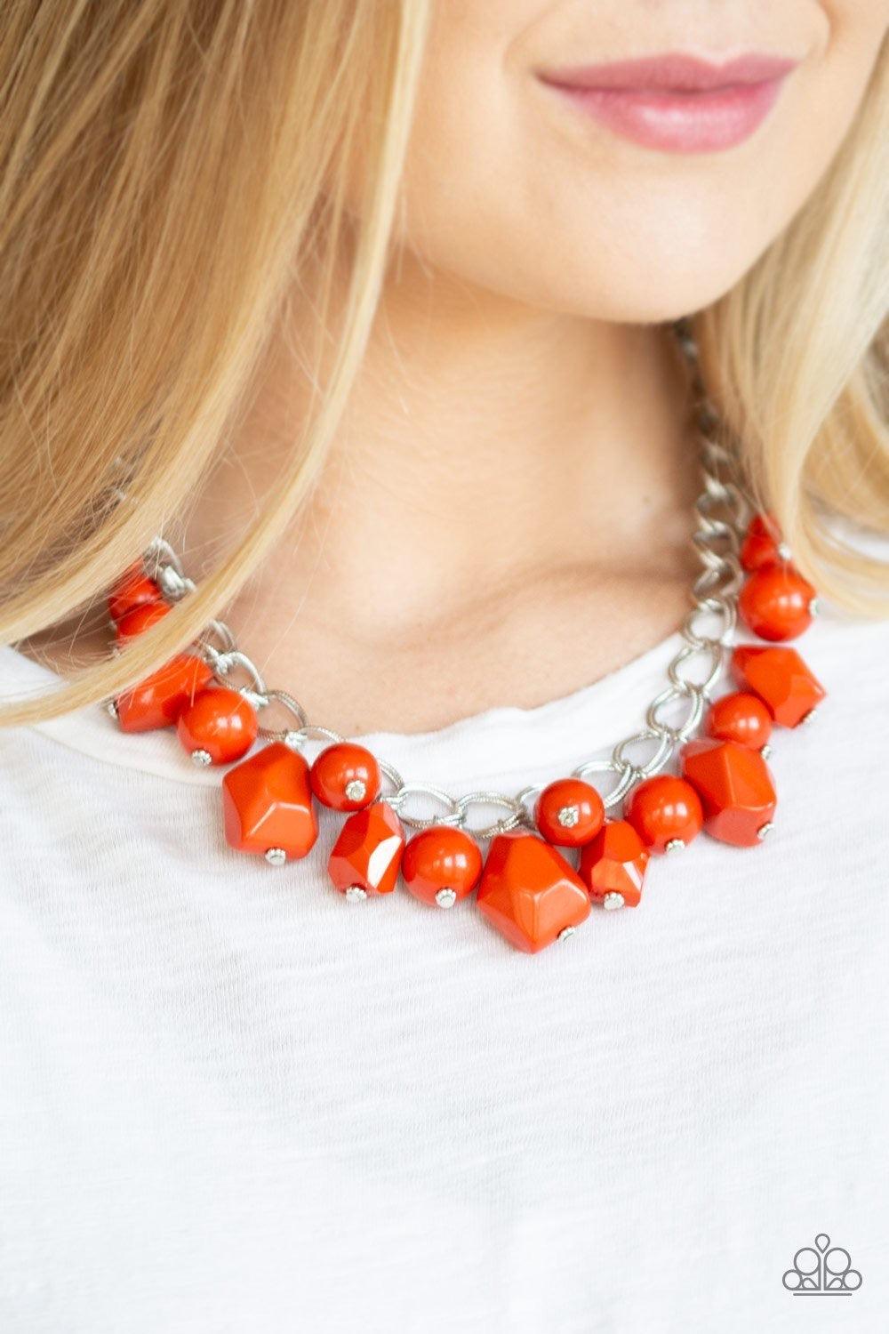 Paparazzi Accessories Gorgeously Globetrotter - Orange Varying in shape and shimmer, smooth and faceted Burnt Orange beads trickle from doubled silver chain links, creating a colorful fringe below the collar. Features an adjustable clasp closure. Jewelry
