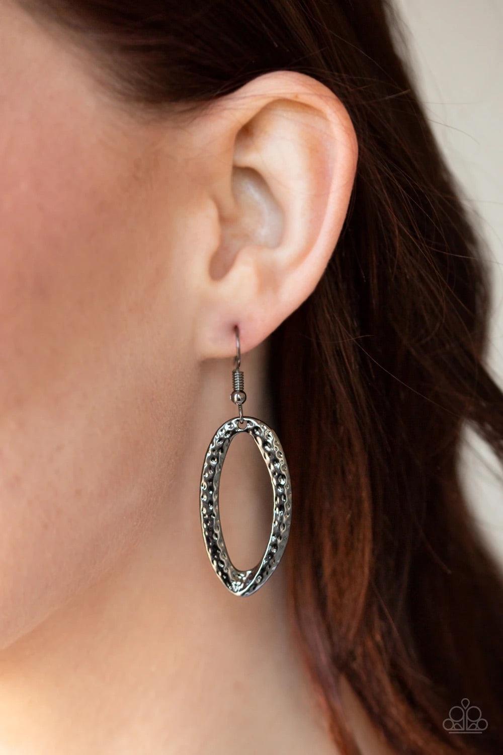 Paparazzi Accessories Urban Artisan ~Black A collection of hammered geometric frames swing from the bottom of a lengthened gunmetal chain, creating a bold artisan inspired pendant. Features an adjustable clasp closure. Sold as one individual necklace. Inc