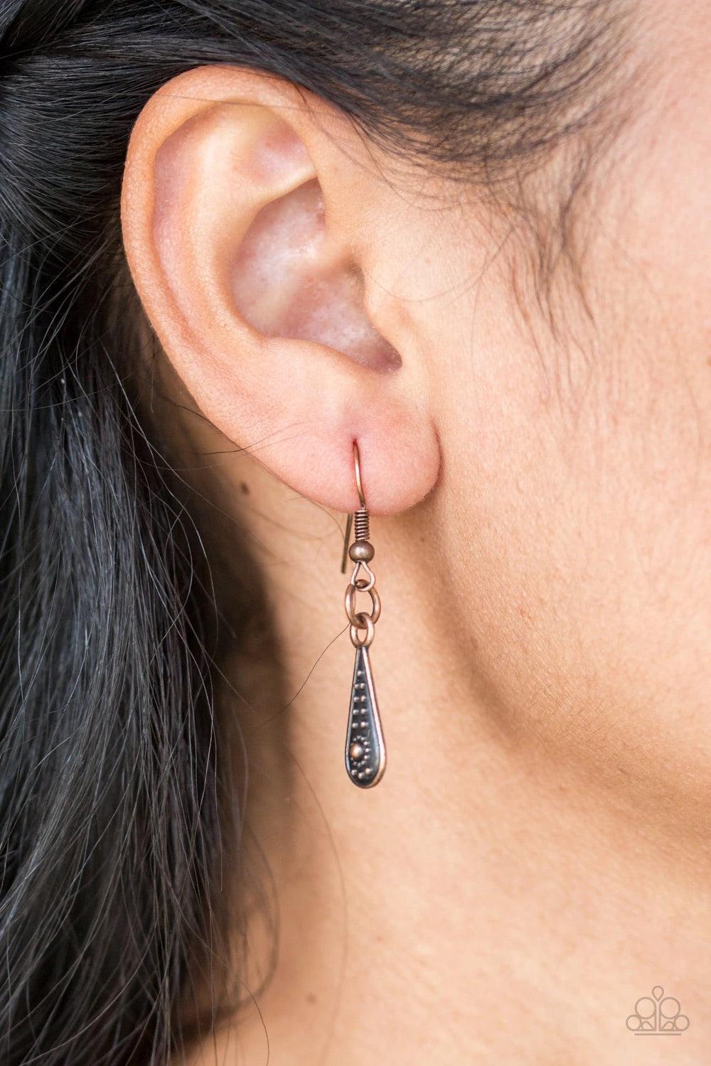 Paparazzi Accessories Go STEER -Crazy - Copper Gradually decreasing in size down the chest, decorative copper crescent plates connect into a bold pendant. Dotted in dainty studs, teardrop copper frames swing from the bottom of the tribal inspired pendant