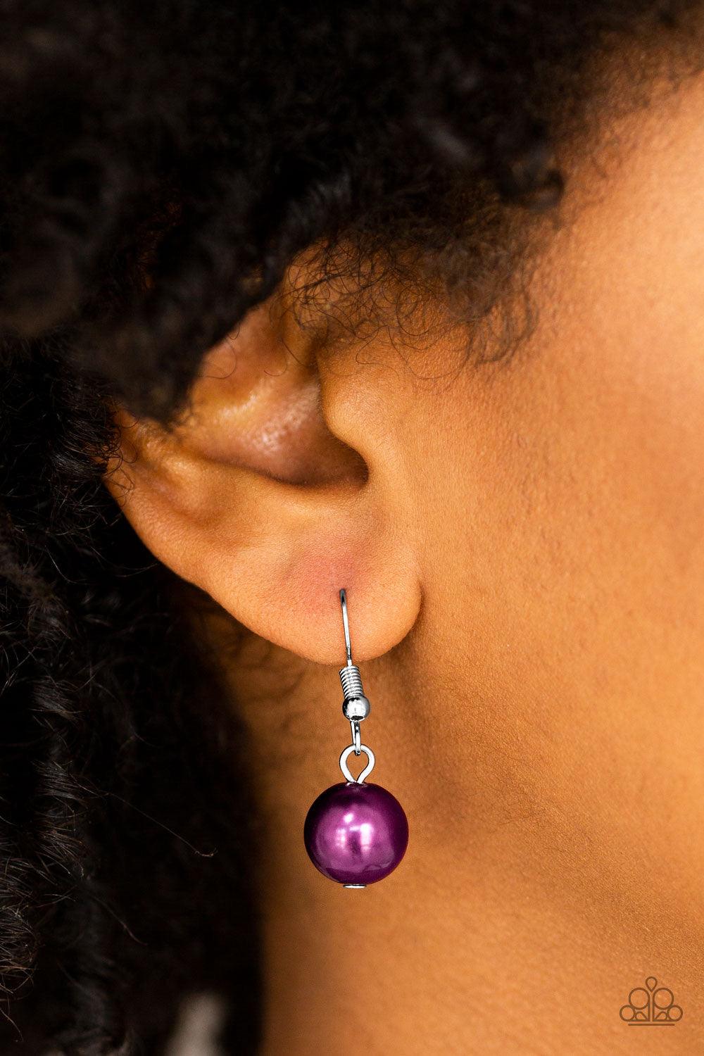 Paparazzi Accessories Soon To Be Mrs. - Purple Varying in size, bubbly purple pearls swing from the bottom of a classic strand of pearls, creating a refined fringe below the collar. Features an adjustable clasp closure. Jewelry