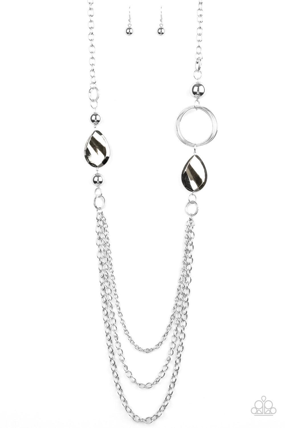 Paparazzi Accessories Rebels Have More Fun - Silver A mismatched collection of oversized silver beads, hoops, and textured silver accents give way to layers of antiqued silver chains down the chest for an edgy industrial look. Features an adjustable clasp