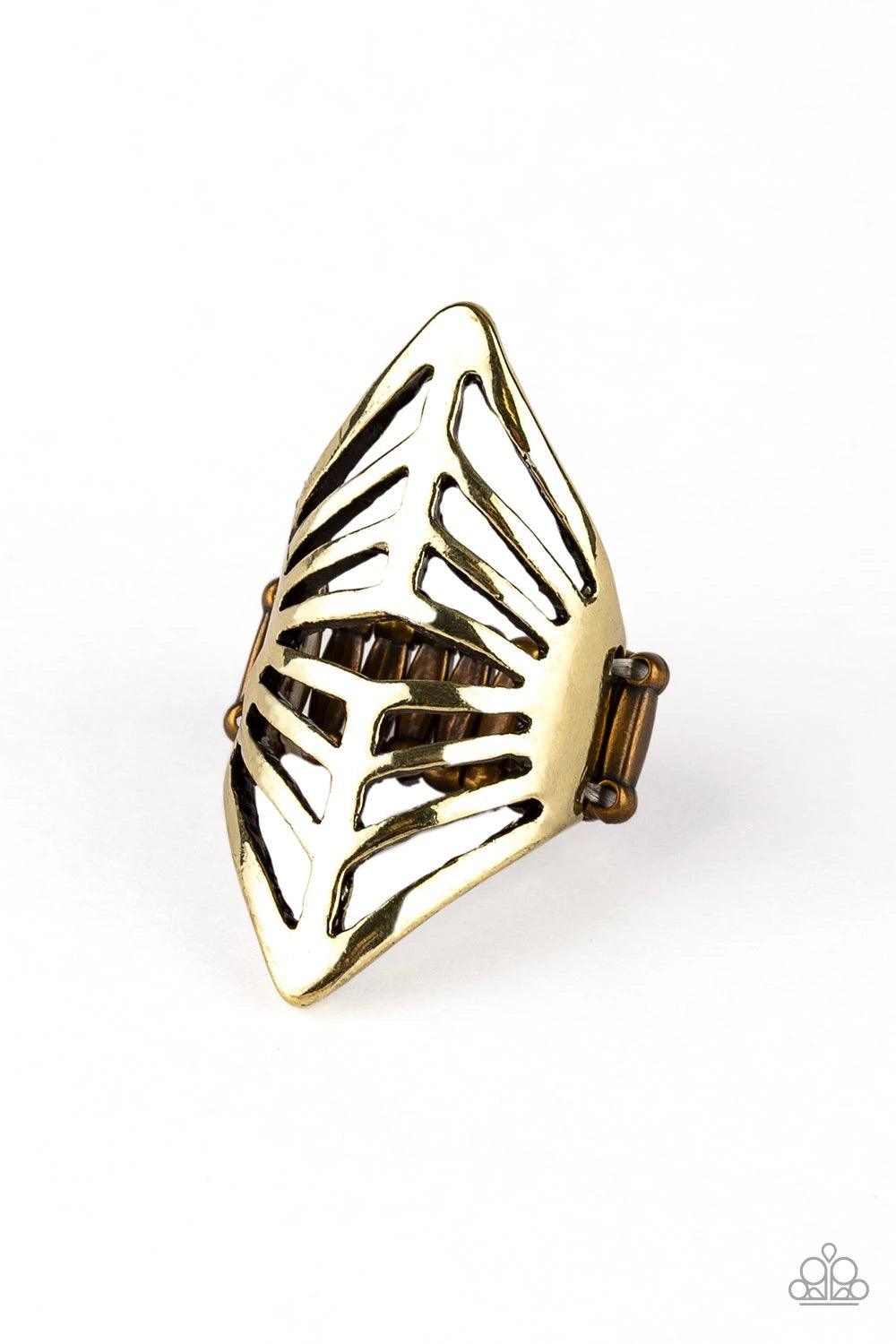 Paparazzi Accessories Deco Defender - Brass Glistening brass bars arc across the finger, coalescing into a bold centerpiece. Features a stretchy band for a flexible fit. Sold as one individual ring. Jewelry