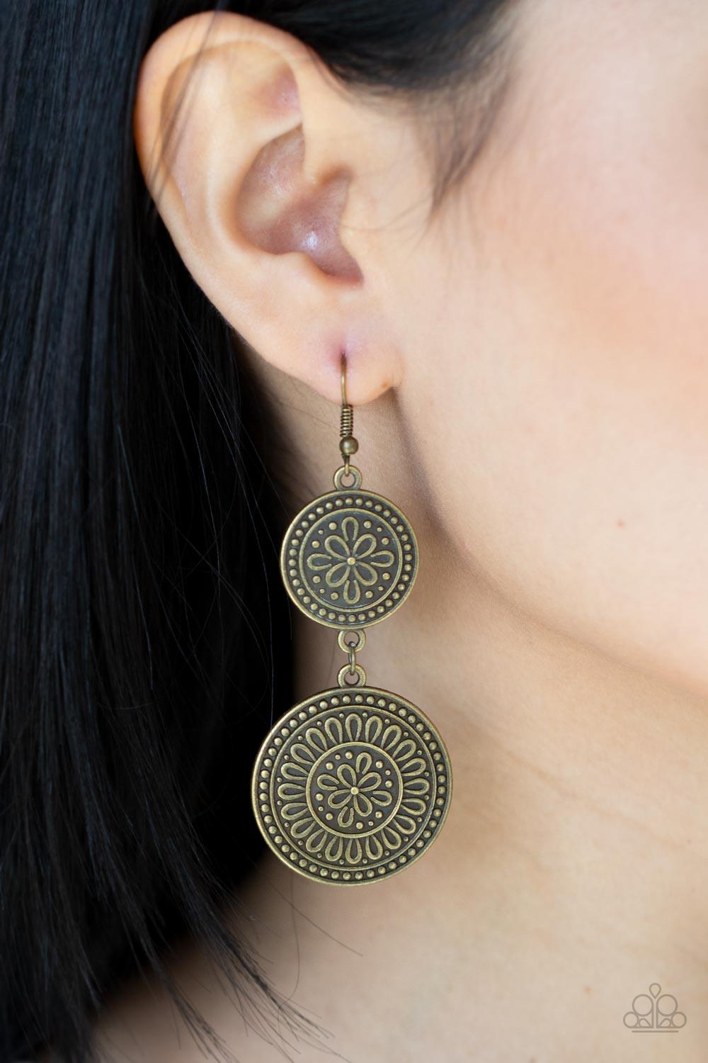 Paparazzi Accessories Road Trip Paradise - Brass Embossed in floral filigree, two round brass frames delicately link into a rustic lure for a whimsy fashion. Earring attaches to a standard fishhook fitting. Sold as one pair of earrings. Jewelry