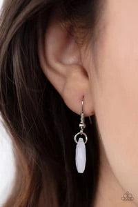 Paparazzi Accessories Eden Dew - White A cluster of dewy white teardrop beads coalesces at the bottom of a lengthened silver chain. Matching beads embedded in airy silver frames dot the chains that climb the chest, bringing an extra pop of color to the wh