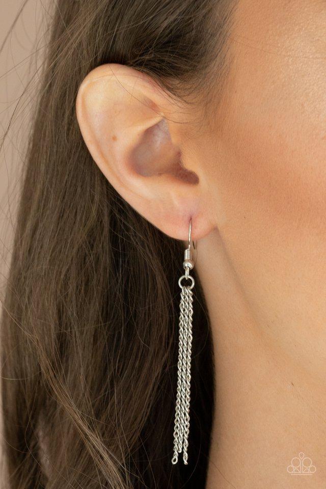 Paparazzi Accessories She Works HEART for the Money - White Cut into a flirtatious heart shape, a dramatically oversized white rhinestone pendant swings from the bottom of a dainty silver chain below the collar for a glamorous finish. Features an adjustab