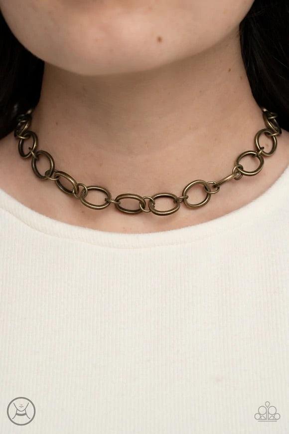 Paparazzi Accessories 90’s Nostalgia - Brass Brushed in an antiqued finish, imperfectly shaped circles link together for a gritty industrial statement. Features an adjustable clasp closure. Jewelry