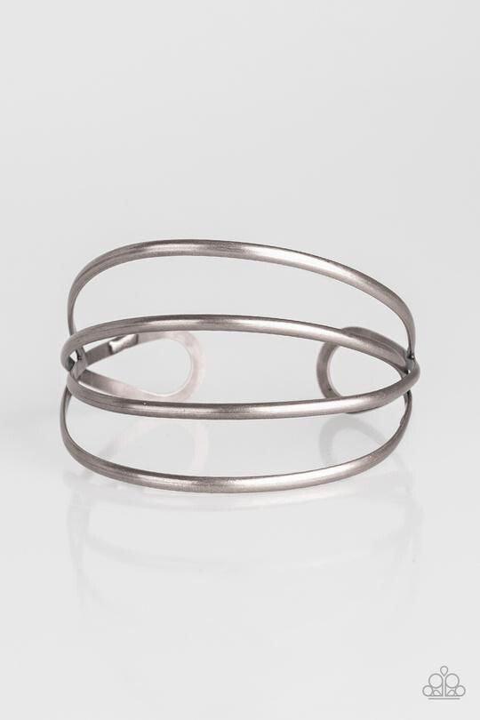 Paparazzi Accessories Take a CATWALK - Silver Glistening silver bars arc across the wrist, coalescing into an airy cuff. Sold as one individual bracelet. Jewelry