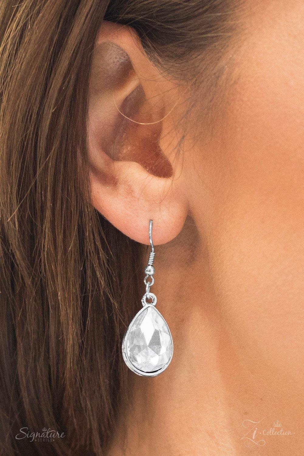 Paparazzi Accessories The Shanae Glittery white gems are pressed into silver teardrop frames, creating a gorgeous tapered fringe below the collar as the sparkling drops link together in vertical rows of blinding shimmer. Features an adjustable clasp closu