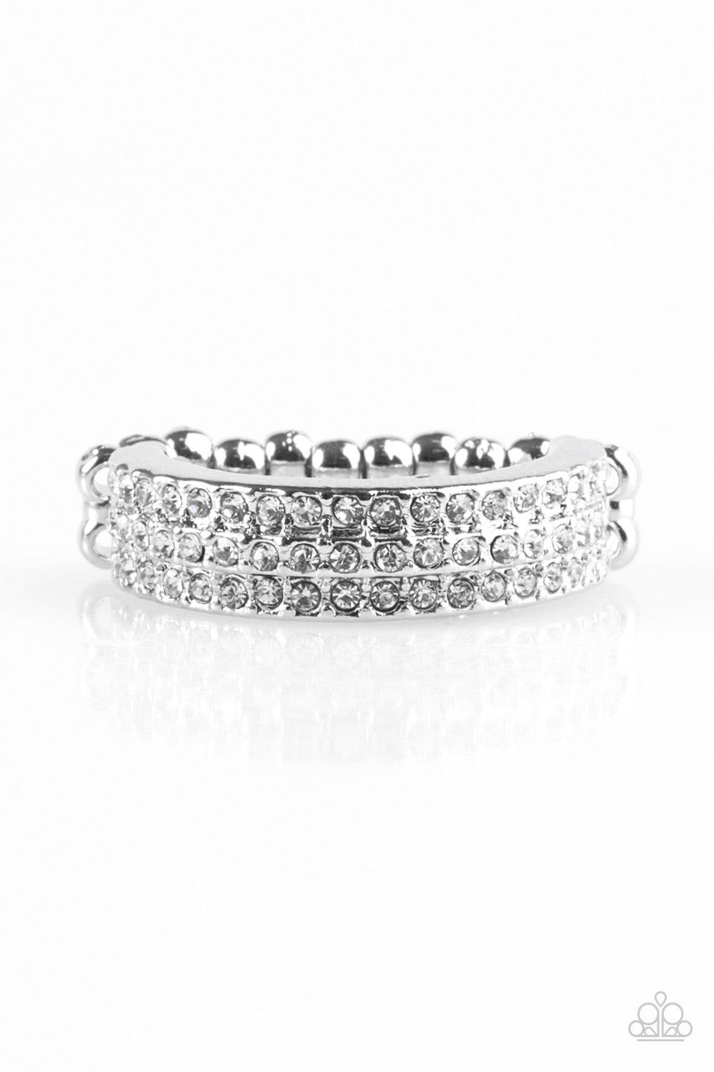 Paparazzi Accessories Turn The Other CHIC - White Featuring a slightly raised center, three shimmery silver bars coalesce into a dainty band. Rows of glassy white rhinestones are encrusted along the band, adding a refined finish to the classic palette. Fe