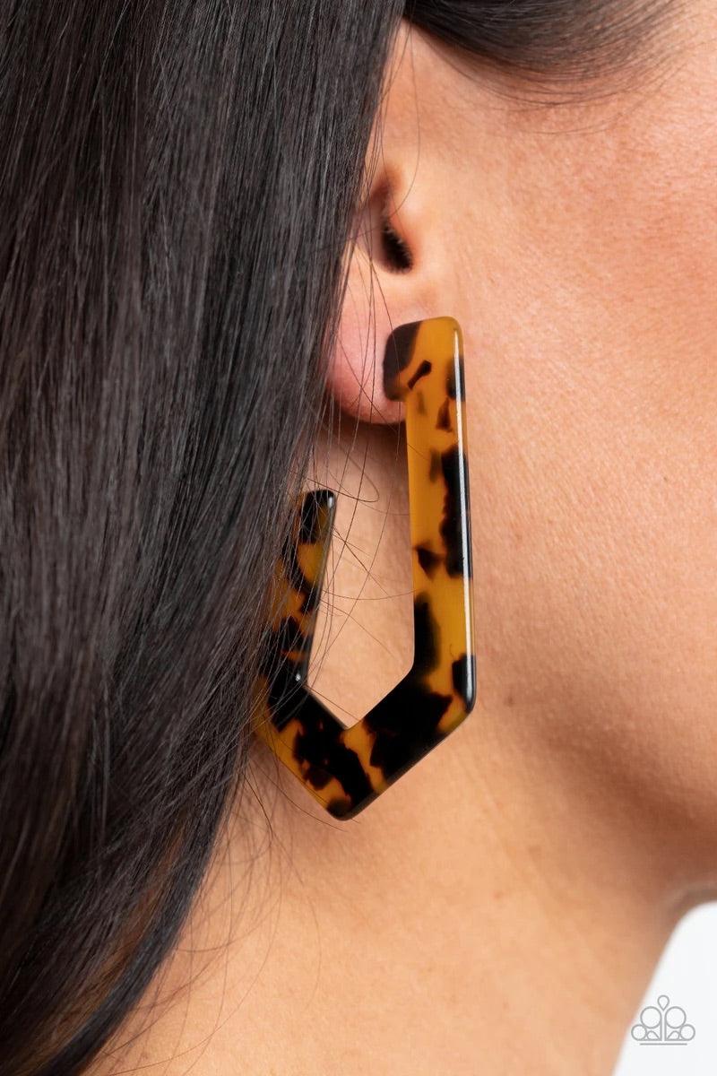 Paparazzi Accessories Flat Out Fearless - Multi Featuring a classic tortoise shell pattern, a speckled acrylic frame delicately bends into an edgy hoop. Earring attaches to a standard post fitting. Hoop measures approximately 1 3/4" in diameter. Sold as o