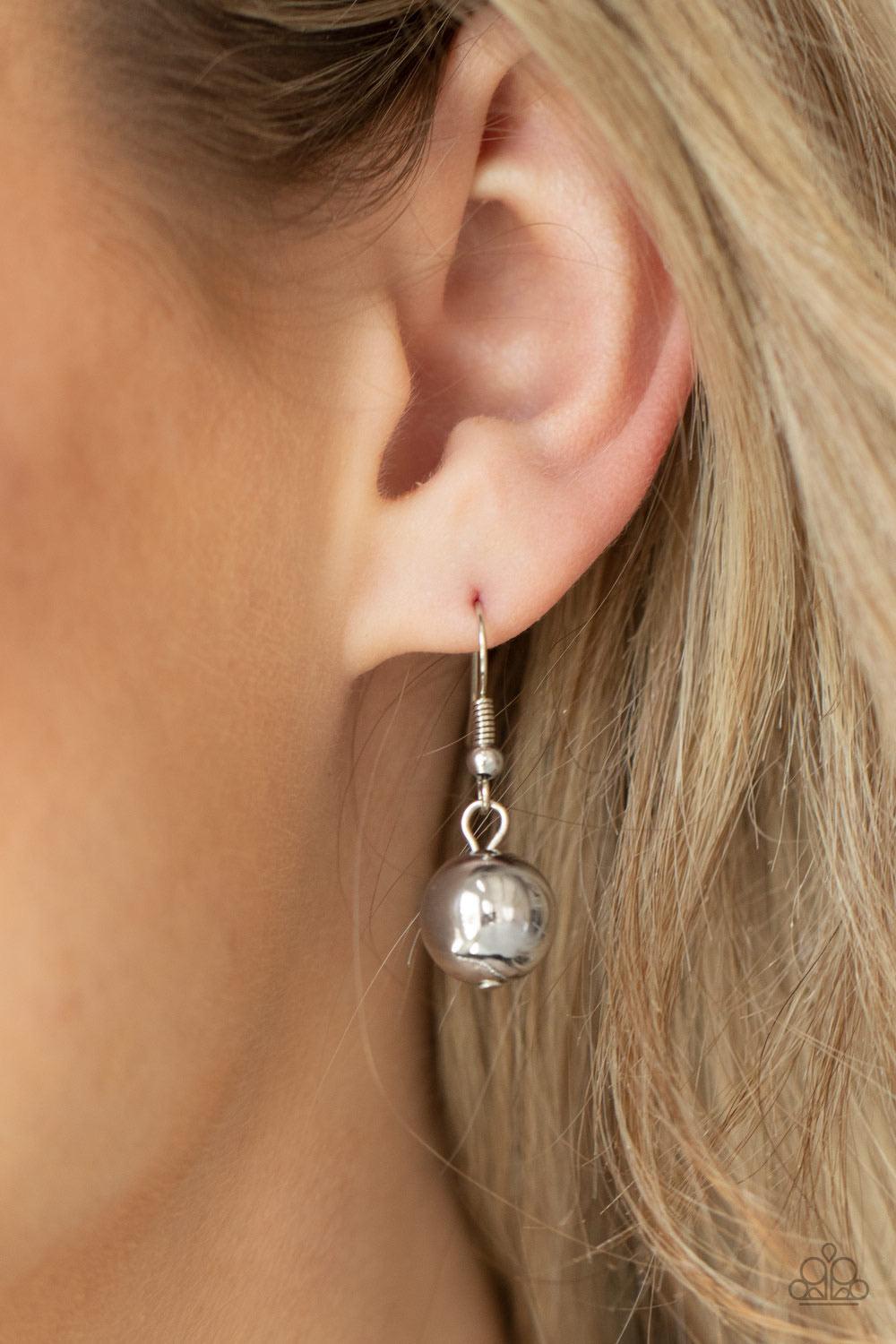 Paparazzi Accessories Twinkle Twinkle, I’m The Star ~White Brushed in a stellar iridescence, hammered pearly beads, classic silver beads, and silver discs gradually increase in size as they join below the collar for a glamorous look. Features an adjustabl