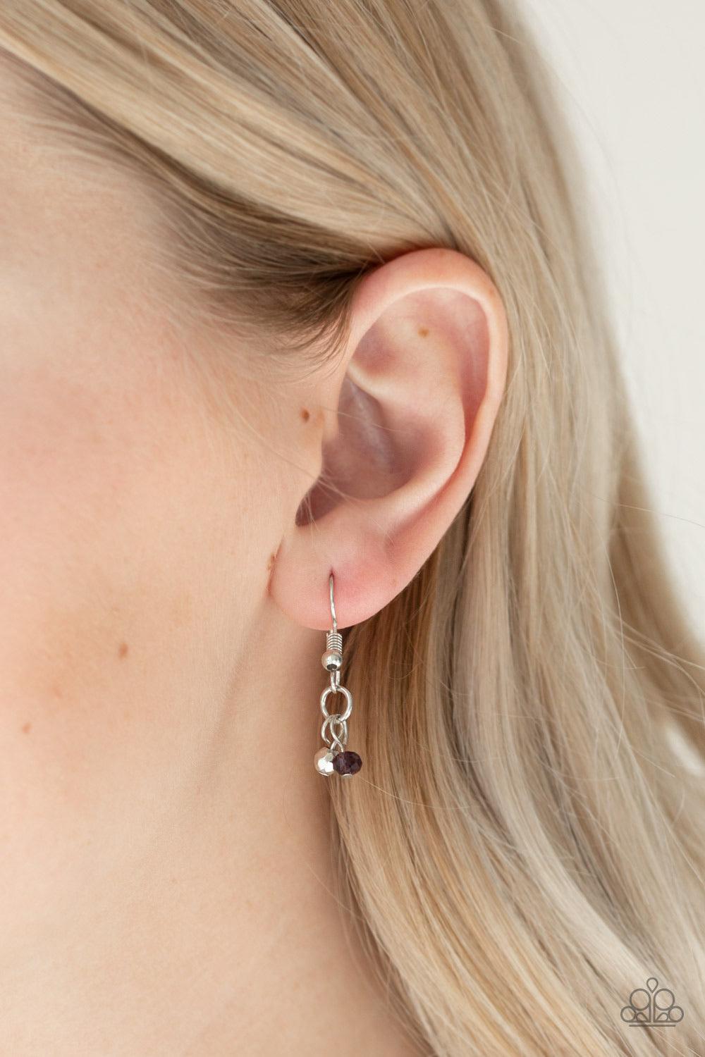 Paparazzi Accessories Financially Fabulous - Purple Dainty silver and purple crystal-like beads cascade from two shimmery silver chains. Infused with plain silver chains, the colorful strands layer below the collar for a flirtatious look. Features an adju