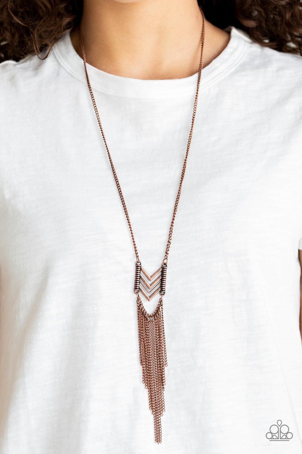 Paparazzi Accessories Point Taken - Copper A stacked chevron-like frame swings from the bottom of a lengthened copper chain, giving way to a shimmery copper tassel for a tribal inspired look. Features an adjustable clasp closure. Jewelry