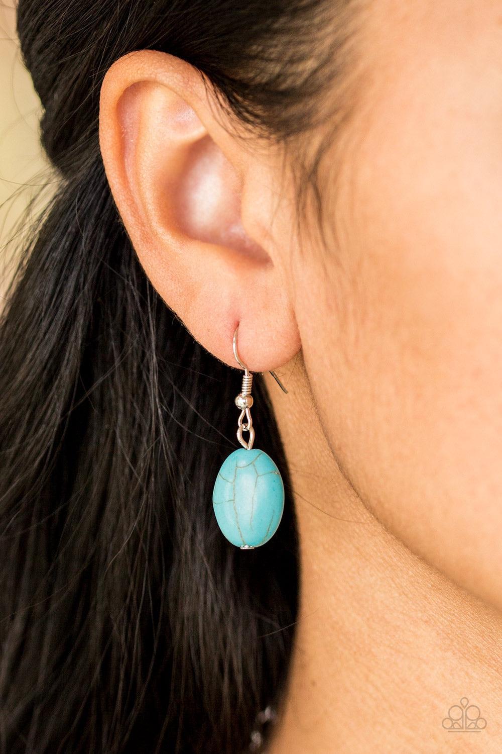 Paparazzi Accessories Leave Your LANDMARK - Blue Radiating with studded and tribal inspired patterns, antiqued silver plates connect below the collar for a fierce look. Refreshing turquoise stones are pressed into the plates, adding an artisan flair to th