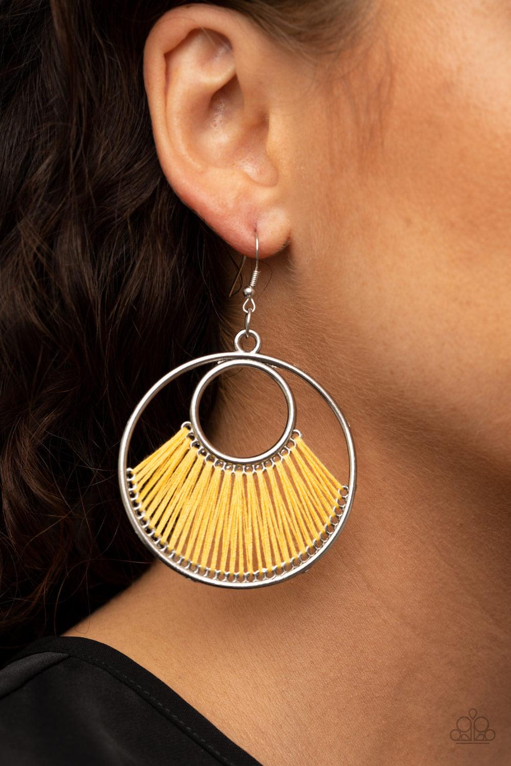 Paparazzi Accessories Really High-Strung - Yellow Golden yellow thread loops through the bottoms of a small and large silver hoop, creating a colorfully fanned-out pattern. Earring attaches to a standard fishhook fitting. Sold as one pair of earrings. Jew