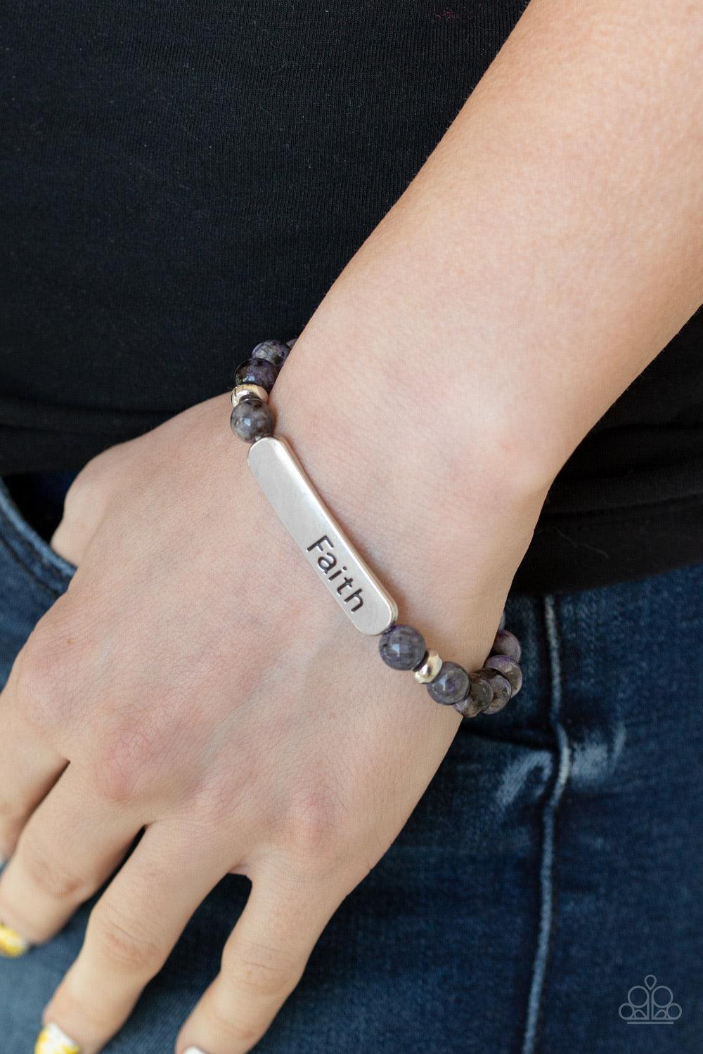Paparazzi Accessories Faith All Things - Purple A collection of purple stones, dainty silver beads, and a silver plate stamped with the inspirational word, "faith", are threaded along a stretchy band around the wrist for a seasonal look. Jewelry