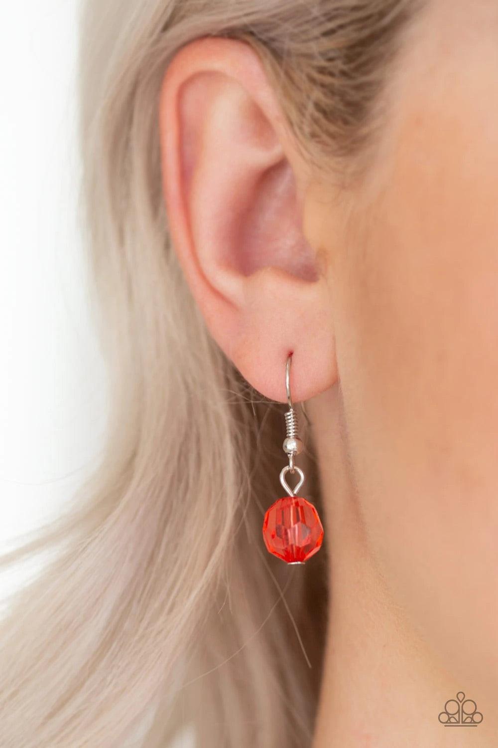 Paparazzi Accessories Glow-Rider - Red Hammered in an array of mismatched textures, three asymmetrical hoops join into an abstract pendant at the bottom of a lengthened brass chain for a handcrafted look. Features an adjustable clasp closure. Sold as one