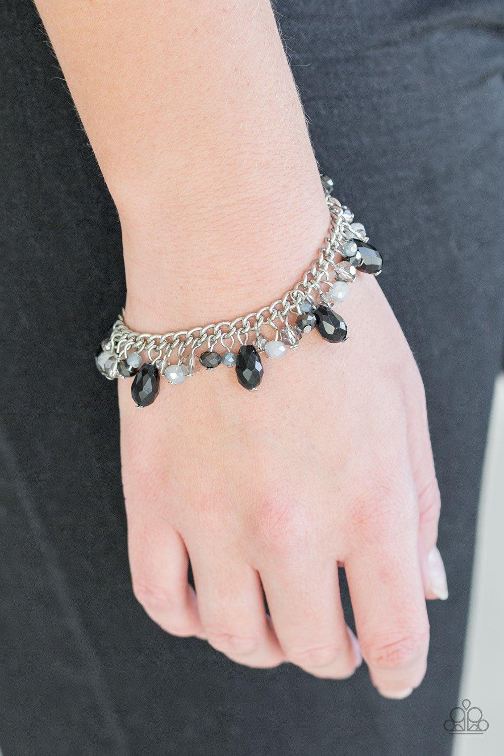Paparazzi Accessories Catwalk Crawl ~Multi Featuring crystal-like and metallic opaque finishes, mismatched beading swings from a shimmery silver chain, creating a glamorous fringe around the wrist. Features an adjustable clasp closure. Sold as one individ