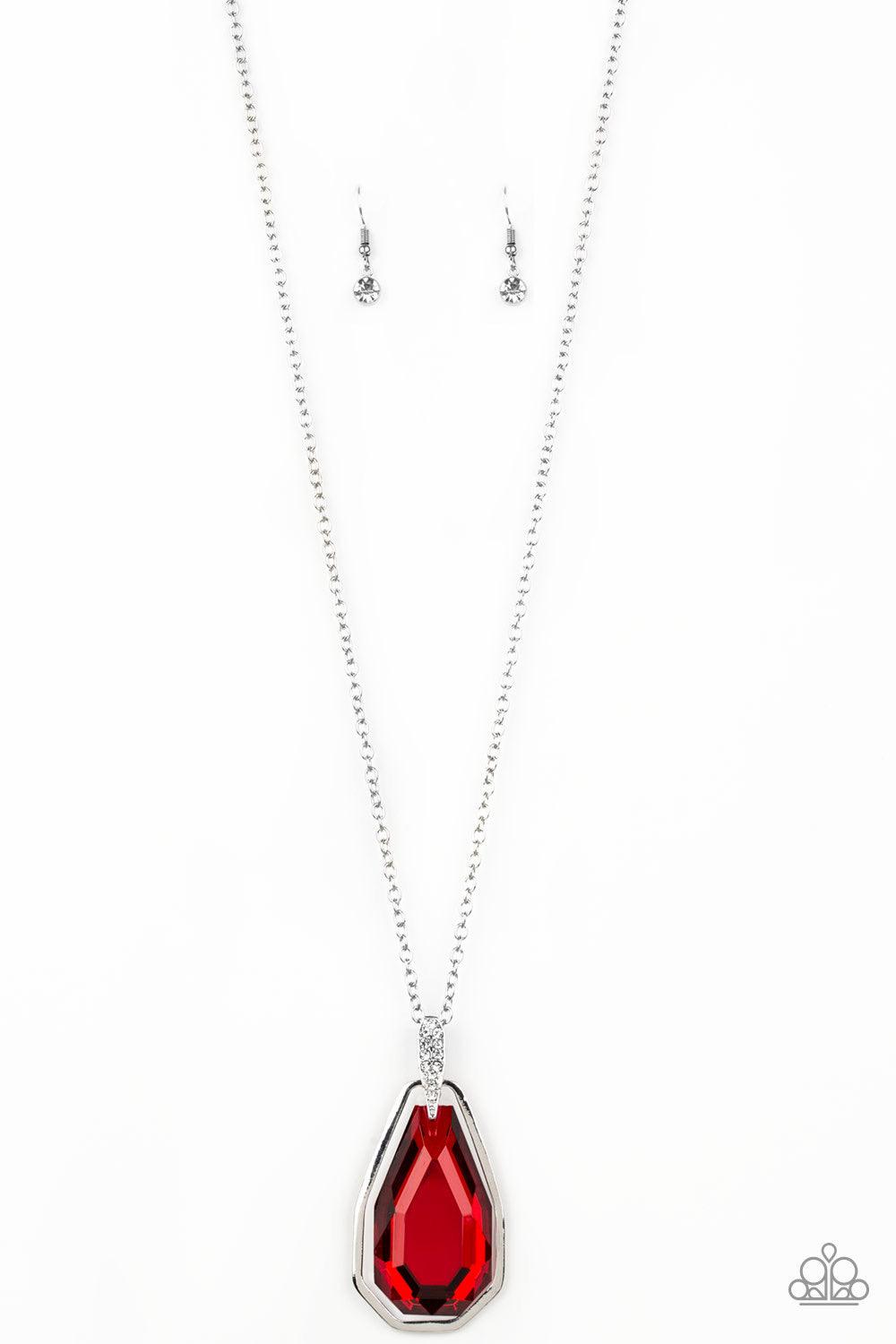 Paparazzi Accessories Maven Magic - Red A dramatically oversized red gem and edgy silver frame swing from a glassy white rhinestone fitting at the bottom of a lengthened silver chain for a glamorous look. Features an adjustable clasp closure. Jewelry