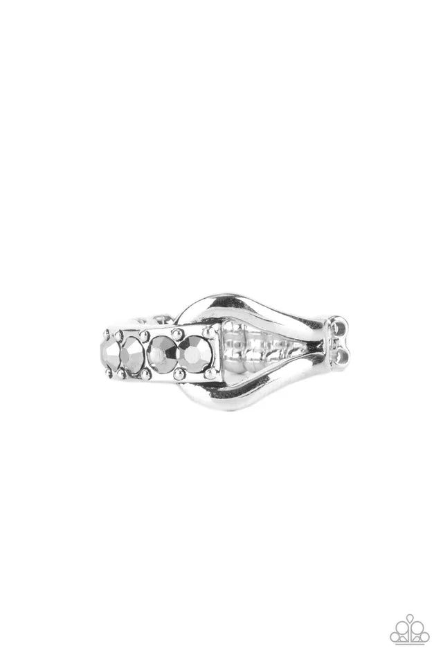 Paparazzi Accessories Bling Bond - Silver A studded band of glitzy hematite rhinestones delicately overlaps with a circular silver fitting, bonding into an edgy centerpiece across the finger. Features a dainty stretchy band for a flexible fit. Jewelry