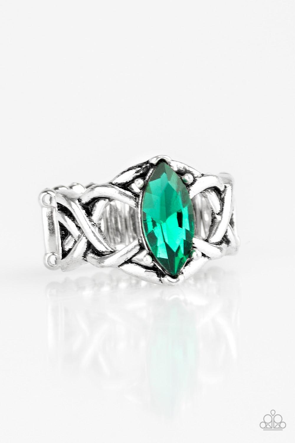 Paparazzi Accessories Princess Prima Donna - Green Featuring a regal marquise style cut, a glittery green rhinestone is pressed into the center of a band swirling with silver filigree for a refined look. Features a stretchy band for a flexible fit. Jewelr