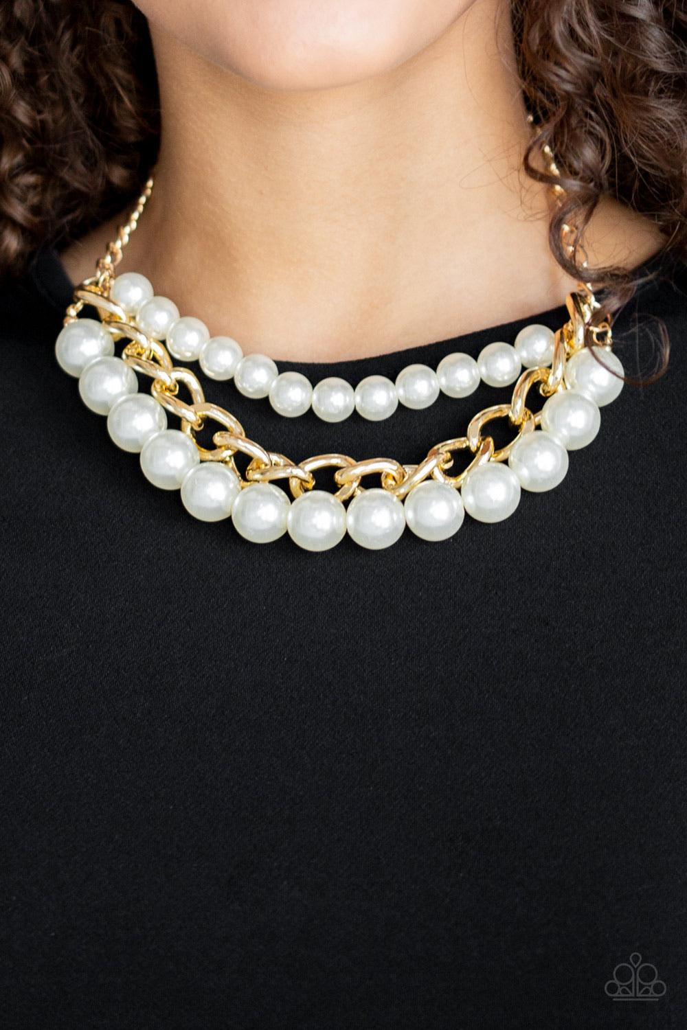 Paparazzi Accessories Empire State Empress - Gold Two strands of dramatic white pearls flank one strand of oversized gold chain, creating statement-making layers below the collar. Features an adjustable clasp closure. Sold as one individual necklace. Incl