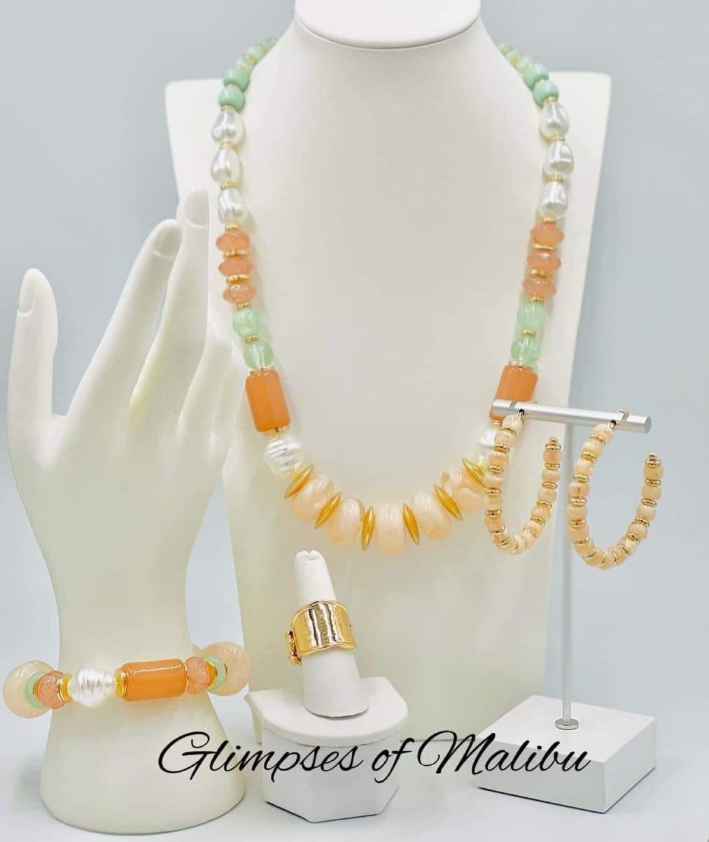 Paparazzi Accessories Glimpses of Malibu: FF December 2022 Featuring playful styles accented with fun pops of color, the Glimpses of Malibu Collection is an endearing assortment of cheerful and whimsical laid-back fashion. From the bubbly outgoing sociali