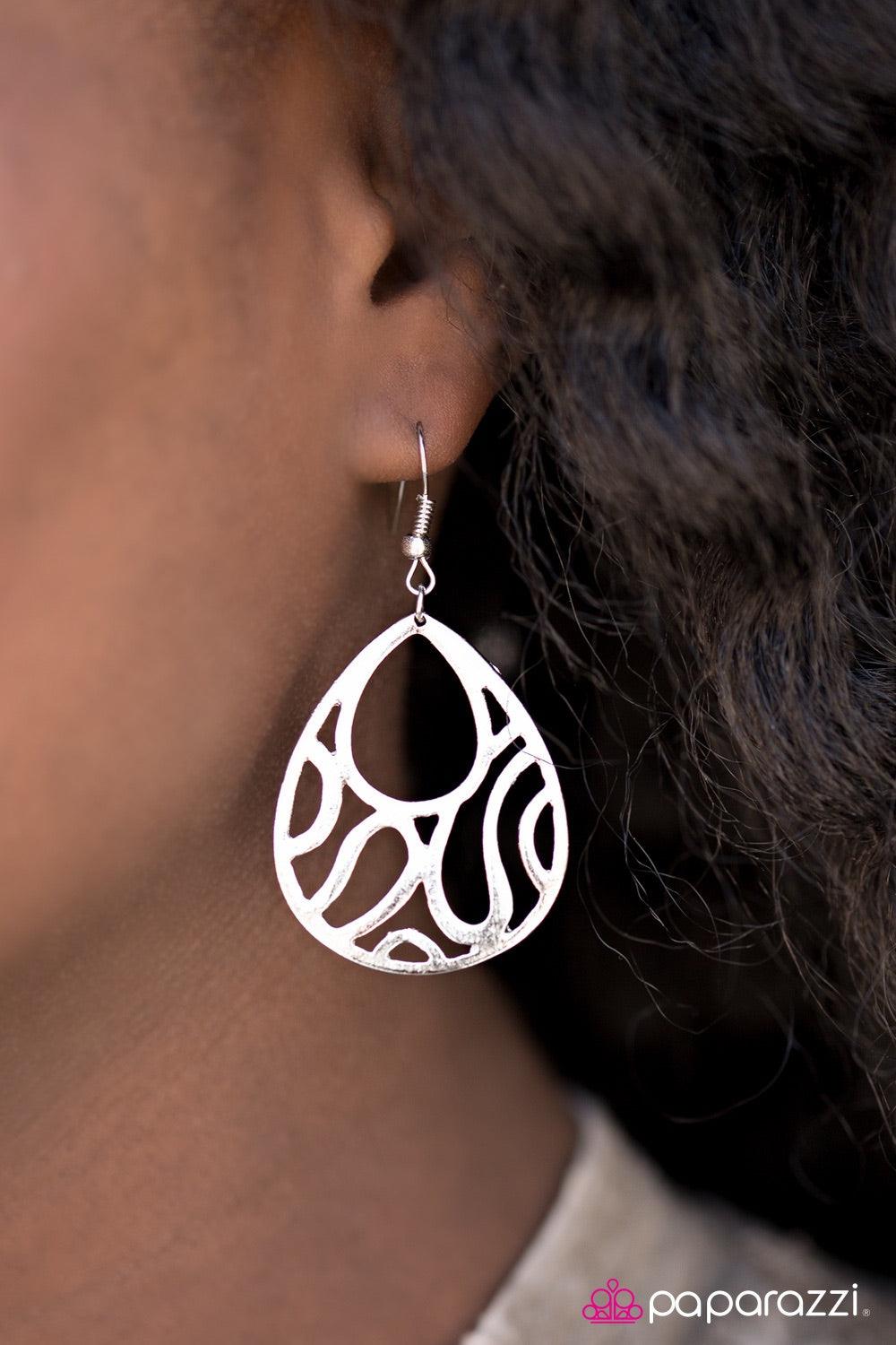 Paparazzi Accessories Waikiki Waves - Silver Brushed in a glistening finish, silver filigree waves across a teardrop lure in a whimsical fashion. Earring attaches to a standard fishhook fitting. Jewelry