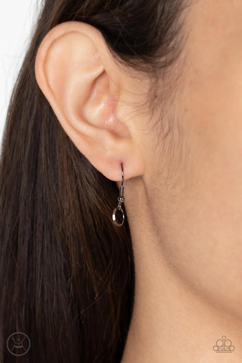 Paparazzi Accessories Cause A Commotion - Black A shiny series of flat and beveled gunmetal hoops delicately cluster along a dainty gunmetal chain around the neck, creating a tinkling fringe. Features an adjustable clasp closure. Sold as one individual ch