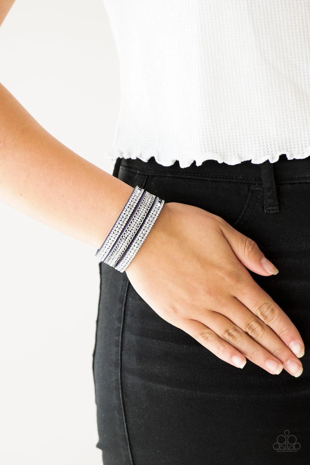 Paparazzi Accessories Fashion Fanatic - Blue Rows of flat silver discs, glassy white rhinestones, and shimmery silver chains are encrusted along blue suede bands for a sassy look. Features an adjustable snap closure. Sold as one individual bracelet. Jewel
