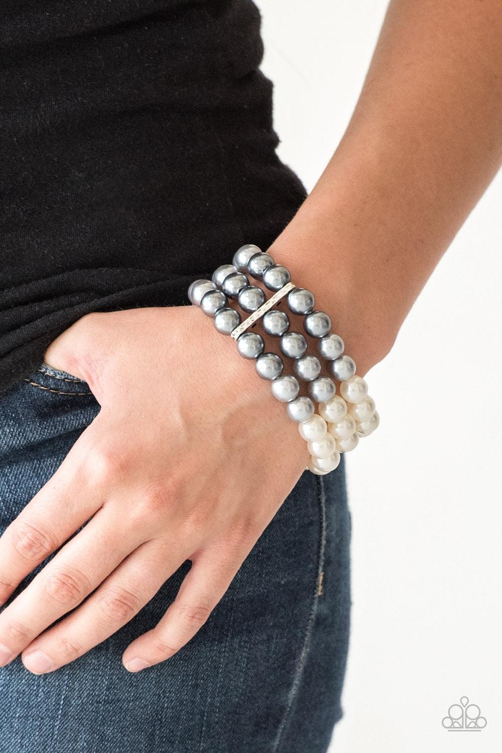 Paparazzi Accessories Central Park Celebrity - Multi Joined together by a hammered silver fitting, white, silver, and dark gray pearls are threaded along stretchy bands, creating an elegant ombre effect around the wrist. Jewelry