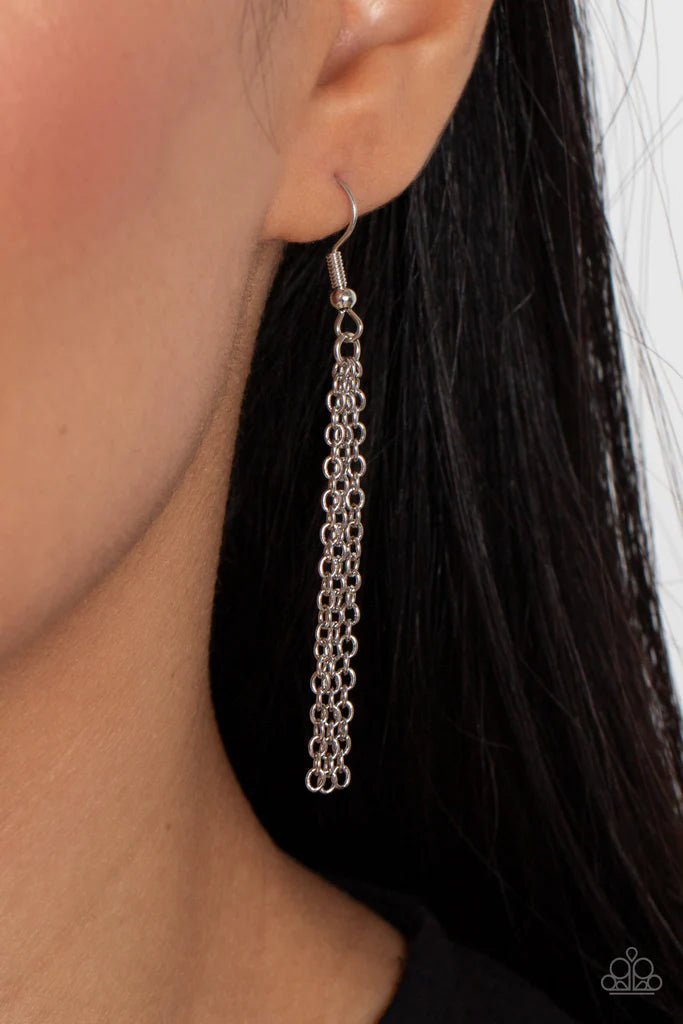 Paparazzi Accessories Celestial Courtier - Yellow A sparkly ombré of iridescent yellow gems adorn the bottoms of three silver hoops that gradually increase in size as they stack into an asymmetrical pendant. The glowing pendant swings from the bottom of a