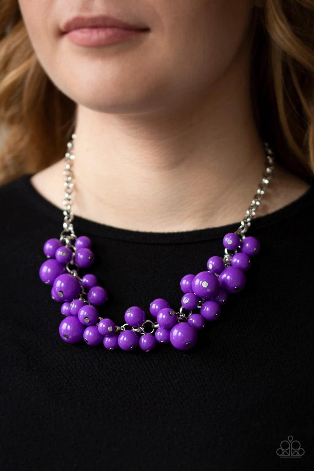 Paparazzi Accessories Walk This Broadway - Purple A collection of bubbly purple beads swing from the bottom of a shimmery silver chain, creating a vivacious fringe below the collar. Features an adjustable clasp closure. Sold as one individual necklace. In