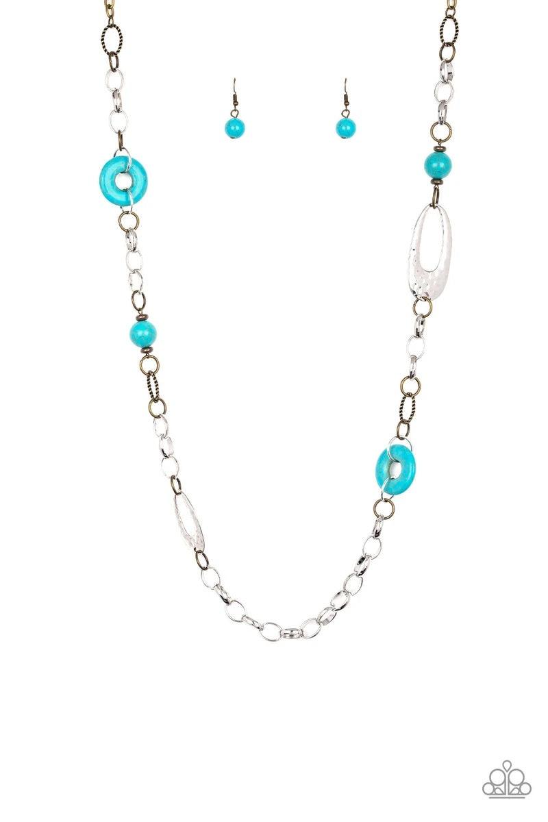 Paparazzi Accessories Artisan Artifact - Multi A compilation of refreshing turquoise stone beads, silver rings, brass rings, and hammered silver accents connect across the chest for an artisan flair. Features an adjustable clasp closure. Sold as one indiv