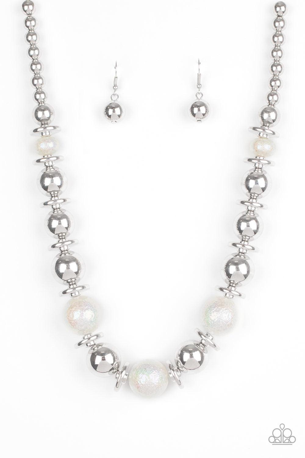Paparazzi Accessories Twinkle Twinkle, I’m The Star ~White Brushed in a stellar iridescence, hammered pearly beads, classic silver beads, and silver discs gradually increase in size as they join below the collar for a glamorous look. Features an adjustabl
