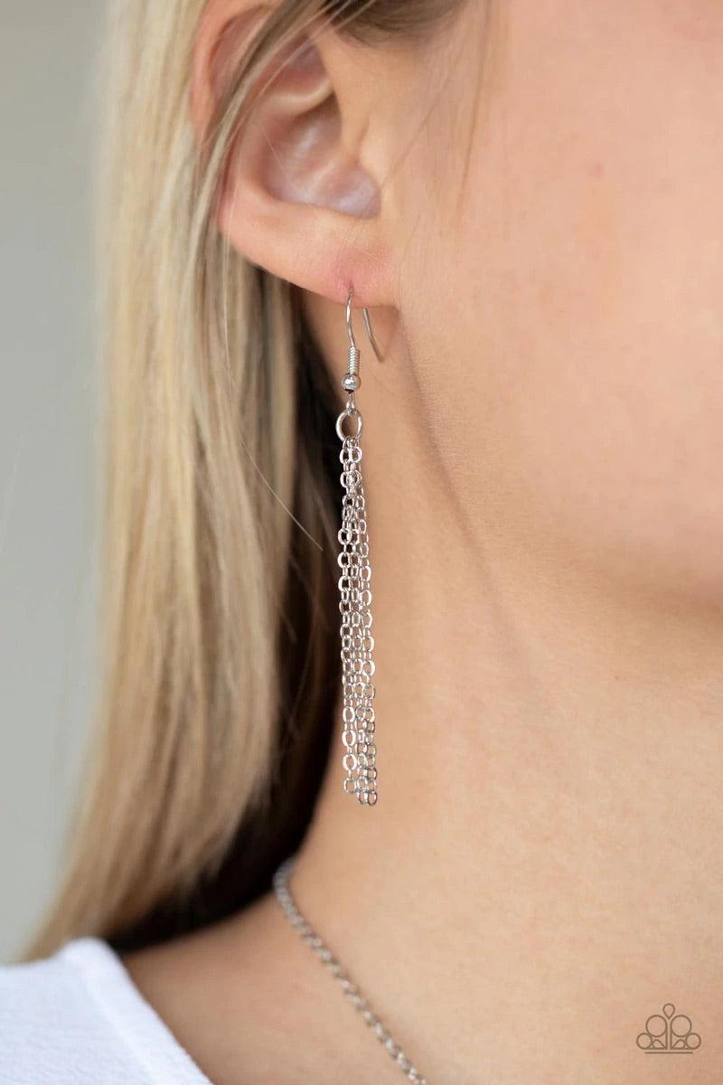 Paparazzi Accessories Prismatically Polished - Black Encased in a sleek silver fitting, an elongated black teardrop gem swings from the bottom of a classic silver chain below the collar for a timeless elegance. Features an adjustable clasp closure. Sold a