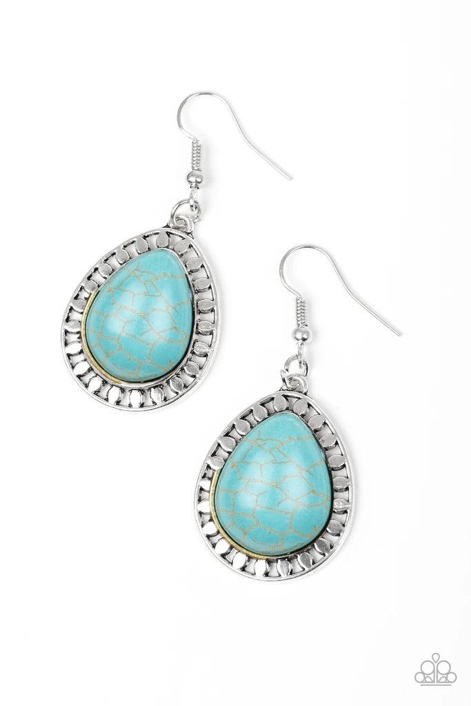 Paparazzi Accessories Sahara Serenity - Blue Chiseled into a tranquil teardrop, a refreshing turquoise stone is pressed into a shimmery silver frame radiating with tribal inspired textures for a seasonal look. Earring attaches to a standard fishhook fitti