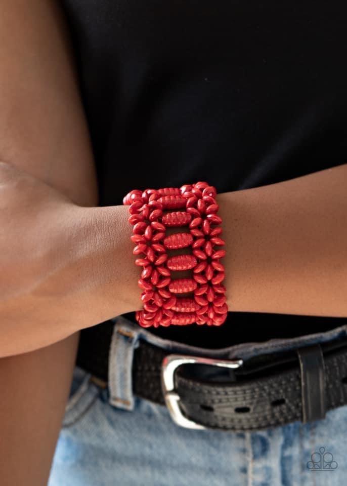 Paparazzi Accessories Fiji Flavor - Red Painted in a fiery red finish, round and oval wooden beads are threaded along stretchy bands that weave into a colorful floral patterned stretch bracelet around the wrist. Sold as one individual bracelet. Jewelry