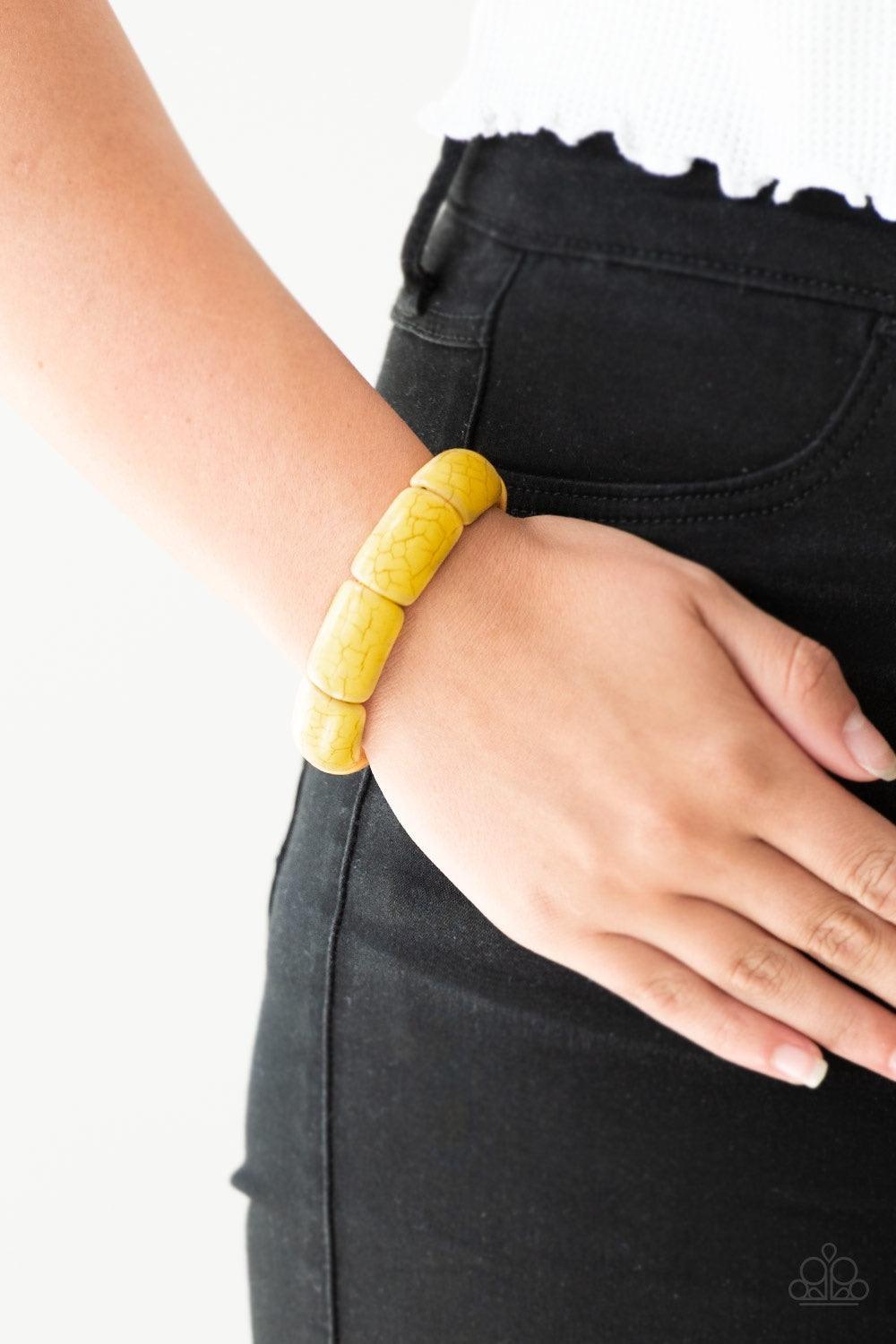 Paparazzi Accessories Peace Out - Yellow Chiseled into smooth rectangular frames, hearty yellow stone pieces are threaded along stretchy bands and linked around the wrist for an earthy look. Jewelry