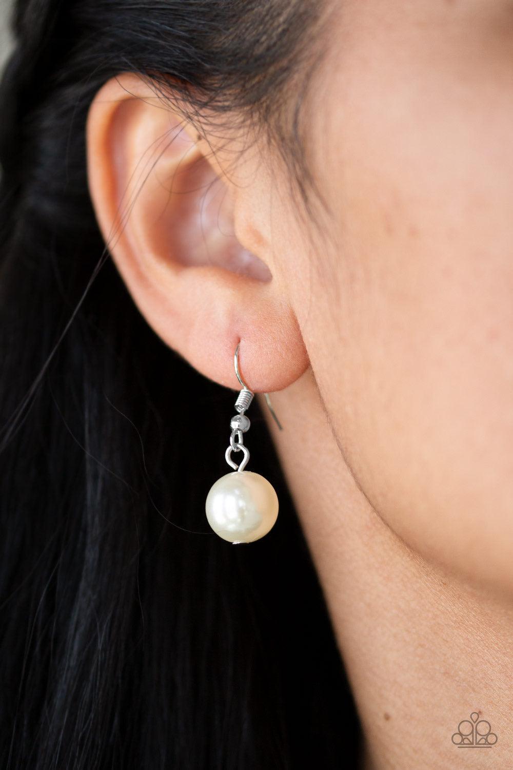 Paparazzi Accessories Soon To Be Mrs. - White Varying in size, bubbly white pearls swing from the bottom of a classic strand of pearls, creating a refined fringe below the collar. Features an adjustable clasp closure. Jewelry
