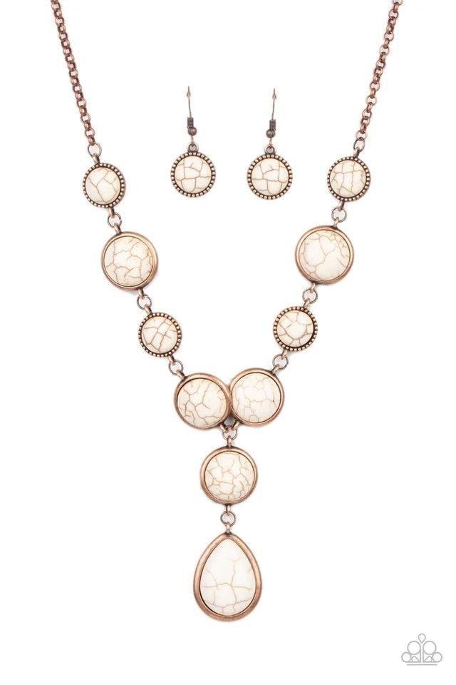 Paparazzi Accessories Terrestrial Trailblazer - Copper Featuring studded and plain copper frames, small and large white stones delicately alternate below the collar. A refreshing white stone teardrop frame swings from the bottom of a matching stone frame,