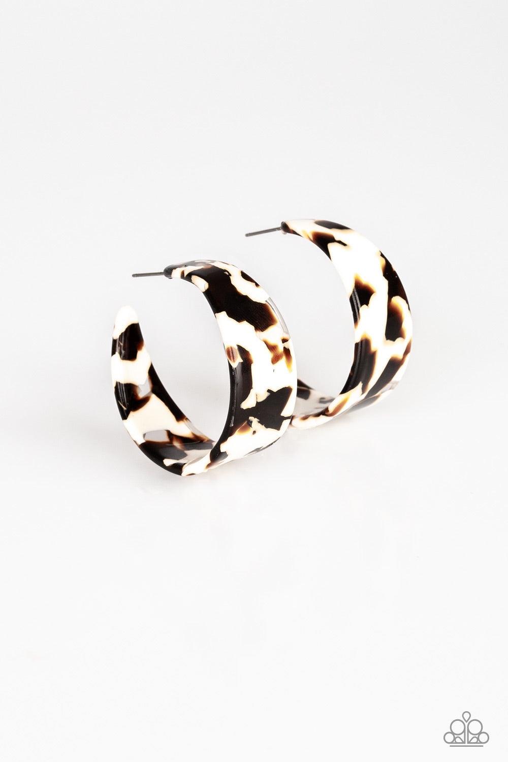 Paparazzi Accessories Havana Heat Wave - White Brushed in a colorful faux marble finish, a flat white hoop curls around the ear for a retro look. Earring attaches to a standard post fitting. Hoop measures 1 1/2" in diameter. Jewelry